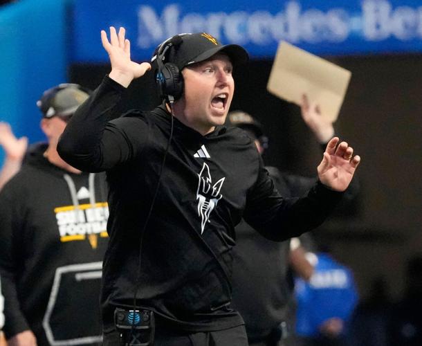 Arizona State head coach Kenny Dillingham calls a play against Texas during the fourth quarter in the Chick-fil-A Peach Bowl in