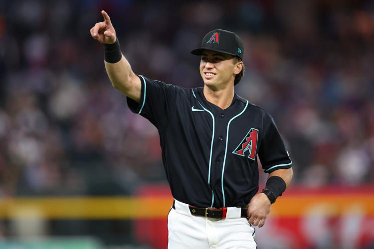 Arizona Diamondbacks right fielder Tommy Troy (9) smiles to the crowd before the game against the Colorado Rockies at Chase Field in Phoenix on May 24, 2026.