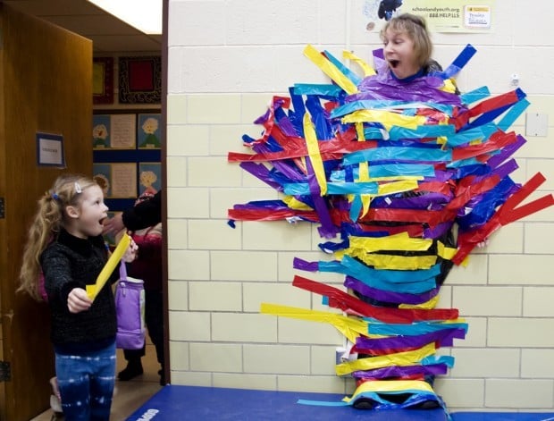 Photo of the day: Principal duct taped to wall