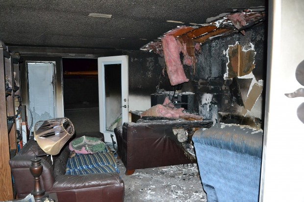 Family of three displaced in house fire on NW side
