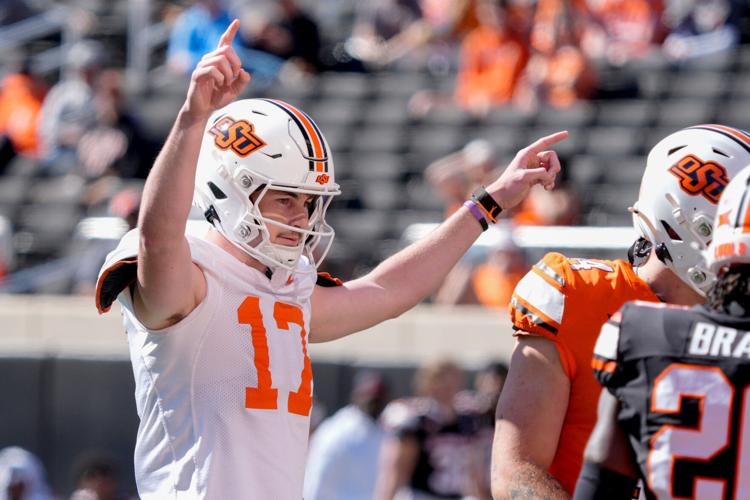 Oklahoma State's Drew Mestemaker celebrates after an OSU touchdown during a spring football game for the Oklahoma State