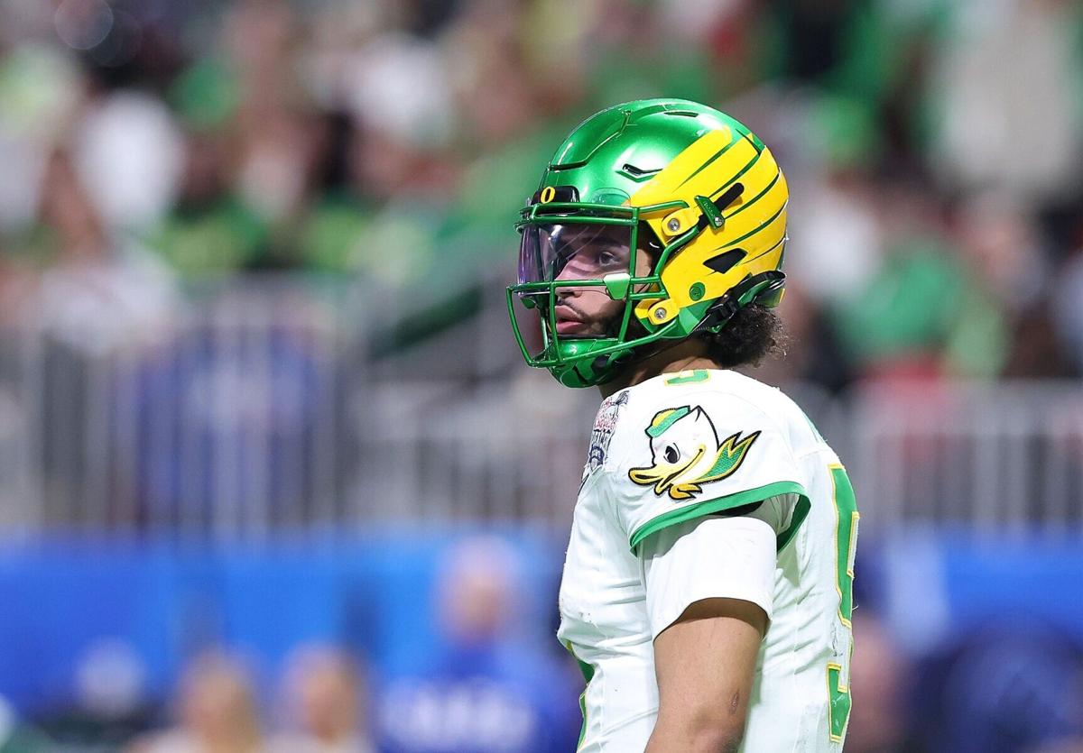 Oregon quarterback Dante Moore looks on during the third quarter against Indiana during the College Football Playoff Semifinal at the Chick-fil-A Peach Bowl at Mercedes-Benz Stadium on Jan. 9, 2026, in Atlanta.