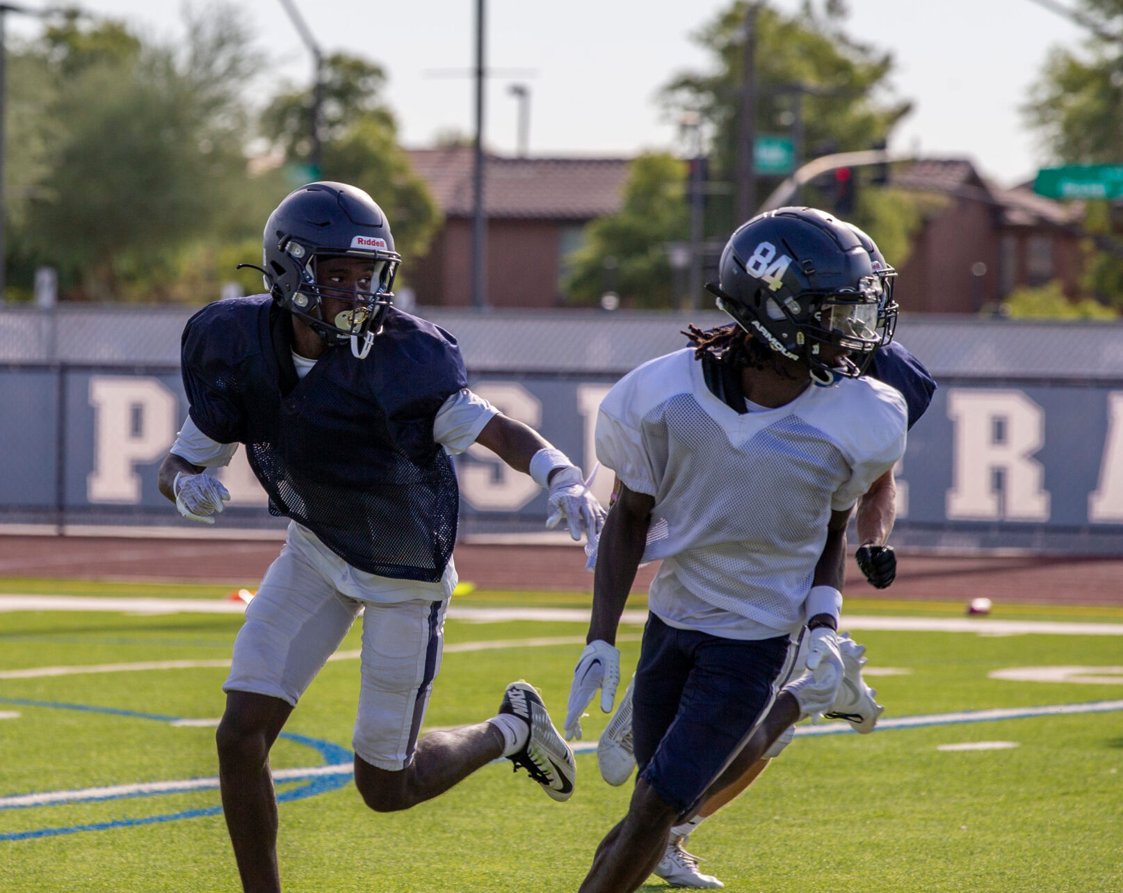 Nasim Eason, defensive back at Higley High School, keeps eyes on the ball during practice at Higley HS football stadium in Gilbert, Arizona, on Aug. 12, 2024.