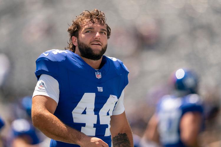 New York Giants running back Cam Skattebo (44) warms up during a preseason opening game between the New York Giants and