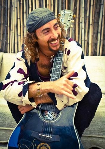 Acoustic guitarist Huckabay has sound connection here   