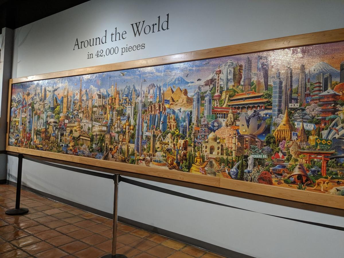 42,000 piece Around the World by Educa. Complete, Mounted, and  (temporarily) Hung. : r/Jigsawpuzzles