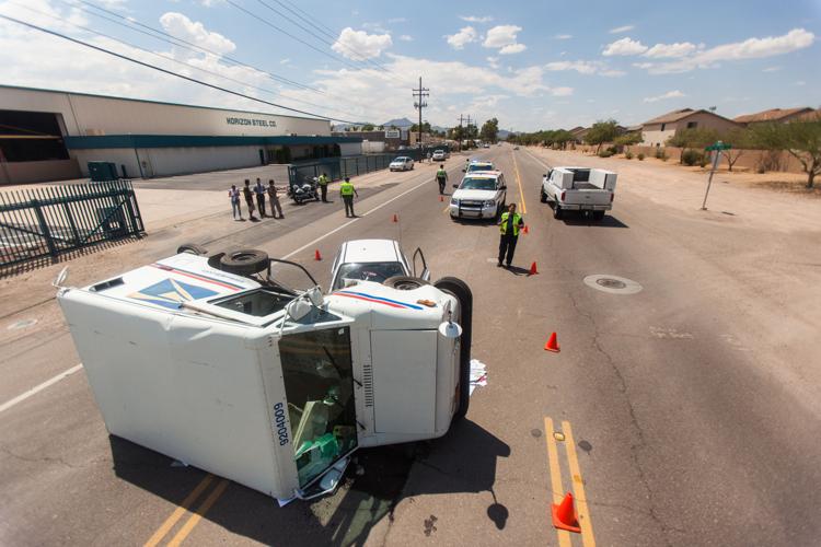 Rollover involving mail truck injures unseatbelted driver News