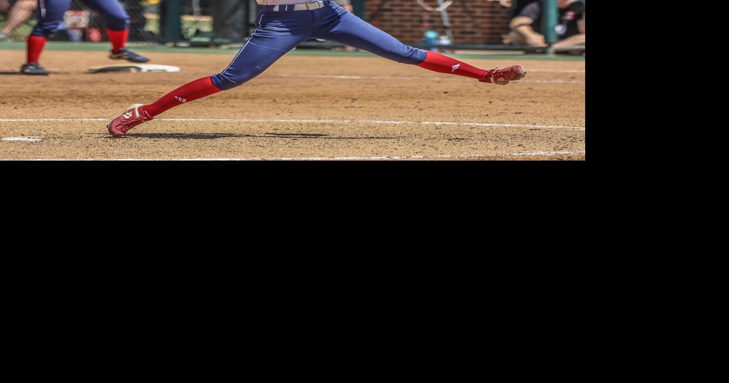 New USA coach, pitcher, keep tradition alive Local News