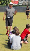 Rhoades launches youth football camp at GMC