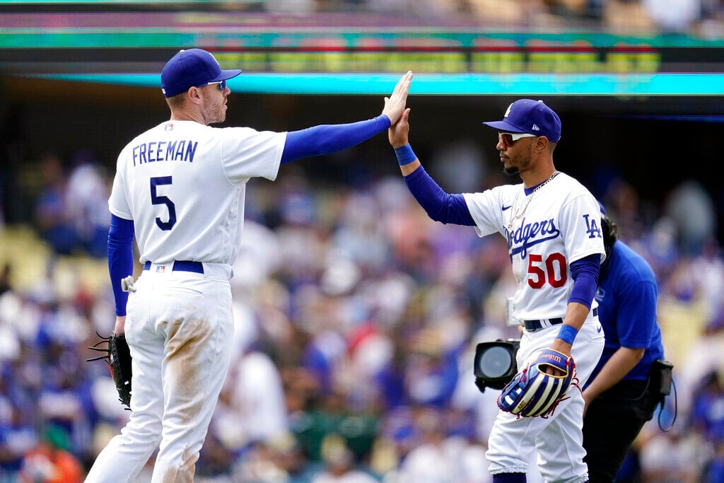 Freeman hits 1st HR for Dodgers vs Braves in reunion game