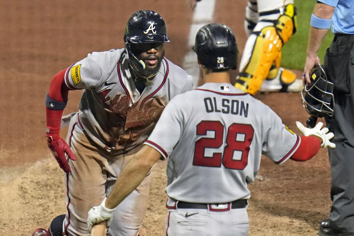 Olson's go-ahead homer helps Braves earn another wild win