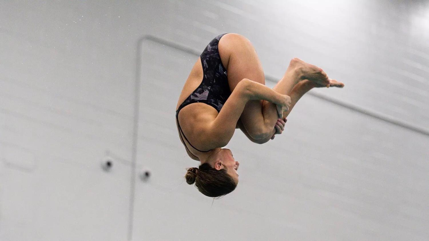 Omaha swim and dive splits against South Dakota on senior night