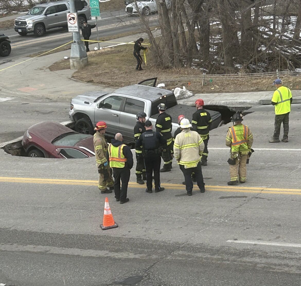 Sinkhole swallows two cars near UNO campus