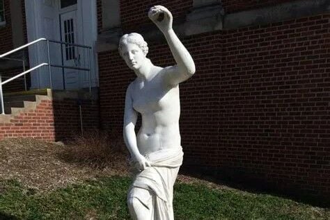 The woman in front of Arts and Sciences Hall