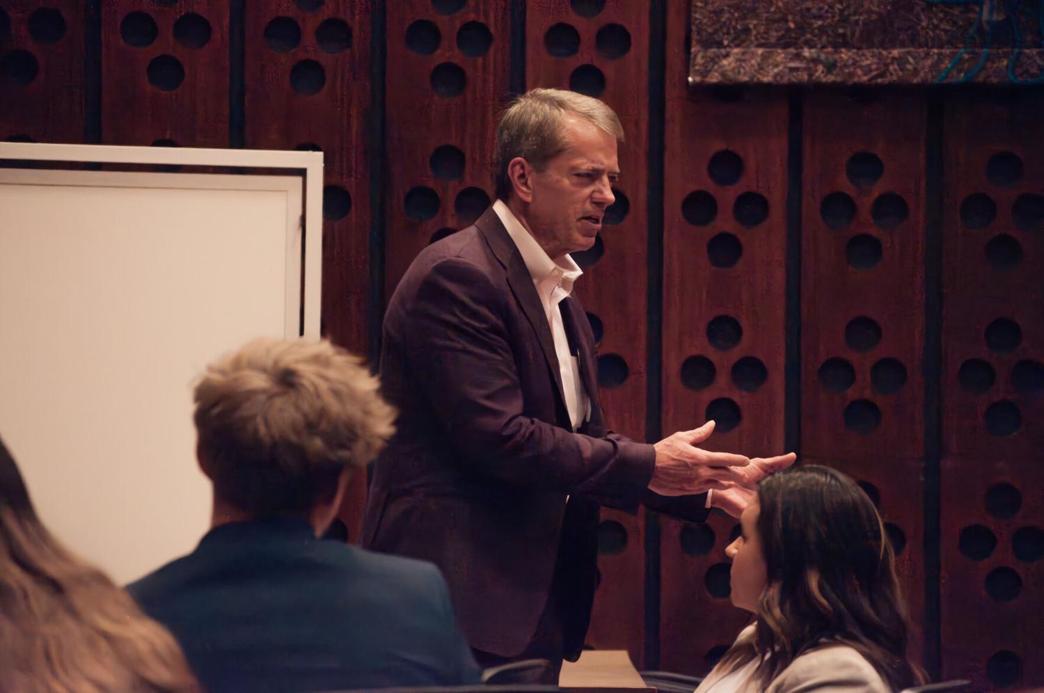 Governor Jim Pillen speaks with students during an exclusive Turning Point event