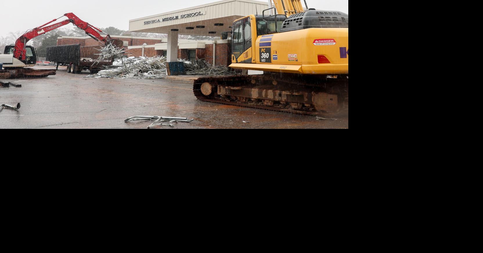 Father and son offer to help with demolishing school