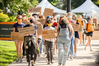 Students march to town hall event in call for increased LGBTQ support