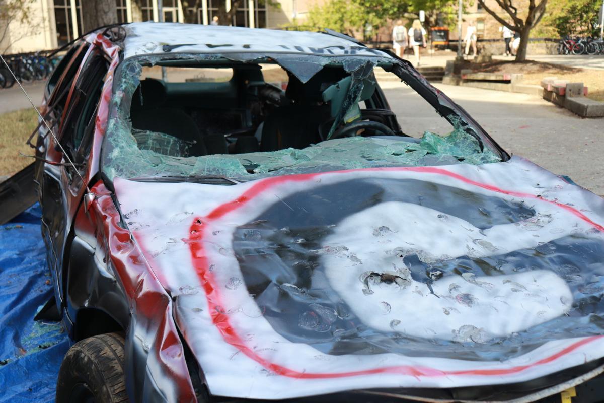 Students smash car with sledgehammers ahead of game in annual