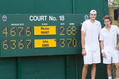 Pro Sports Roundup: John Isner makes history at Wimbledon