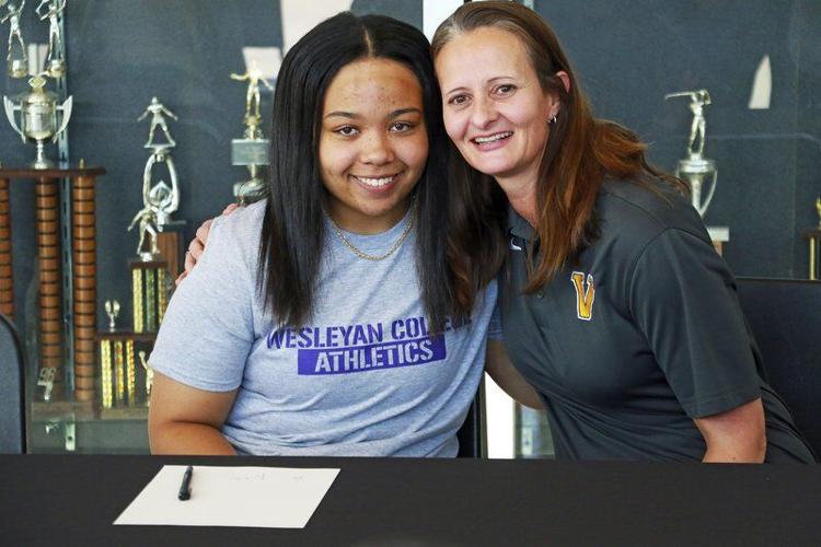 VHS volleyball's Alivia Fennell signs with Wesleyan
