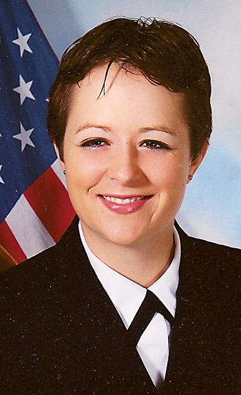 Andrea Moore commissioned as an Ensign