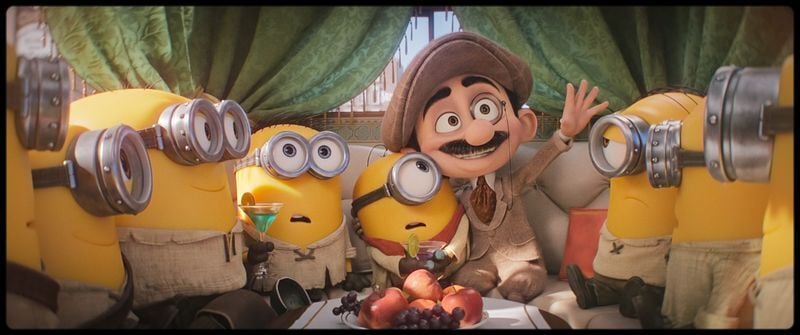 European director Max, center, realizes the Minions' potential as silver-screen stars in "Minions & Monsters."