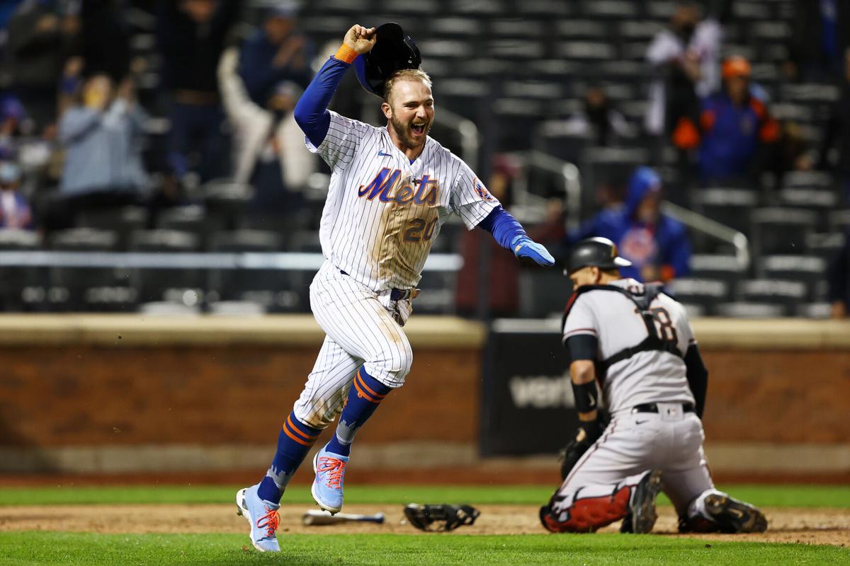 Pete Alonso of the New York Mets celebrates after scoring the game-winning run in the bottom of the 10th inning against the Arizona Diamondbacks at Citi Field in New York on Friday, May 7, 2021.