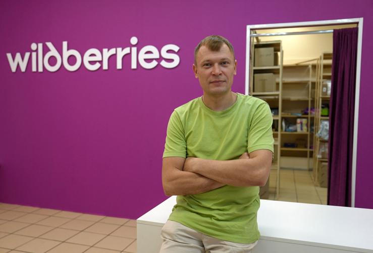 Owner of Wildberries franchised pick-up point Vasily Klimov poses for a picture in Moscow