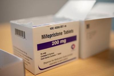 Mifepristone tablets sit on Dr. Sarah Traxler's desk in her office at the Planned Parenthood clinic in Ames, Thursday, July 18, 2024.