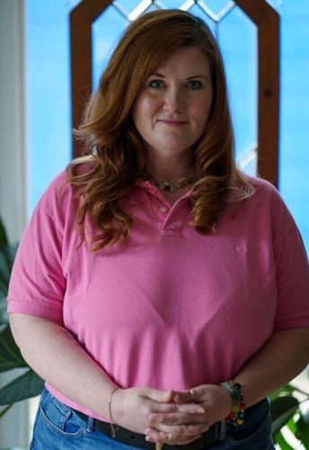 Sara Love poses for a portrait in her home Friday, June 5, 2026, in Des Moines. Love is the creator of the free app Sister Signal, designed to protect individuals facing domestic abuse.