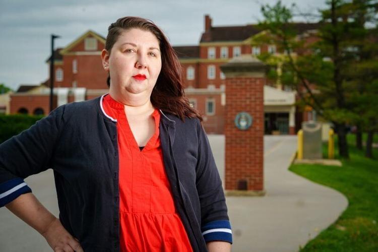 Daphne Quinn, registered nurse and union representative at VA Hospital Des Moines stands for a photo in front of the Des Moines VA Medical Center, May 21, 2026.