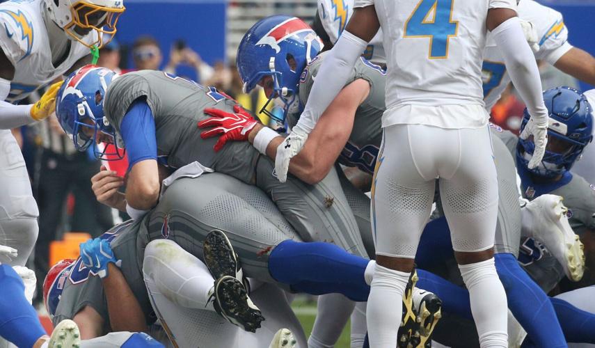 Bills quarterback Josh Allen dives into the end zone on a quarterback sneak for a second quarter touchdown against the Chargers