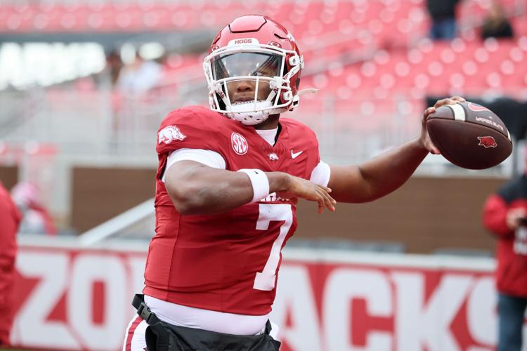 Arkansas Razorbacks quarterback KJ Jackson (7) warms up prior to a game against the Missouri Tigers at Donald W. Reynolds Razorback Stadium.