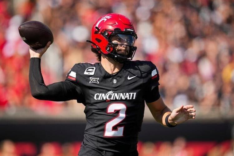 Oct 4, 2025; Cincinnati, Ohio, USA; Cincinnati Bearcats quarterback Brendan Sorsby (2) throws a pass against the Iowa State Cyclones in the first half at Nippert Stadium.