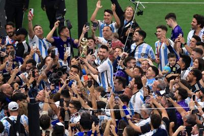 Lionel Messi of Argentina lifts the FIFA World Cup Qatar 2022 Winner's Trophy after the FIFA World Cup Qatar 2022 Final match between Argentina and France at Lusail Stadium on Sunday, Dec. 18, 2022, in Lusail City, Qatar.