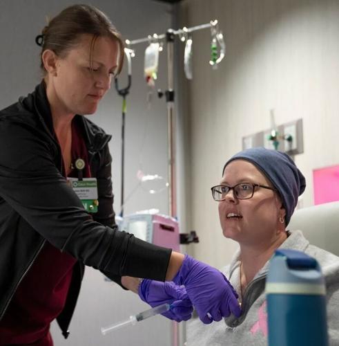 Victoria Means receives chemotherapy at the Tyler Family Cancer Center at the Cass County Memorial Hospital Monday, Aug. 3, 2026 in Atlantic, IA.