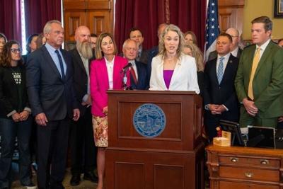 Sen. Kara Warme, R-Ames, speaks before Governor Kim Reynolds signs House File 2676, known as the Iowa "MAHA" bill at the Iowa State Capitol, May 20, 2026.