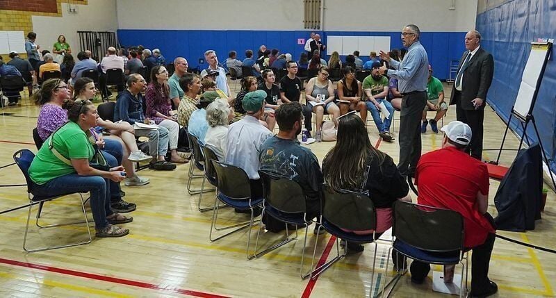 City council member Tim Gartin and city manager Steve Schainker answer questions during the Ames City Council's listening session about a possible data center on Tuesday, June 30, at City Auditorium in Ames, Iowa.