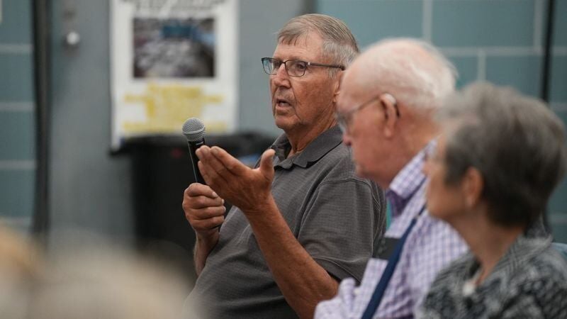 Chuck Virgil, a 78-year-old Sutherland resident asks a question to Iowa Democratic gubernatorial candidate Rob Sand during his 100 Town Hall tour on Tuesday, July 21, 2026, at Yesterday's Memories in Sanborn, Iowa.