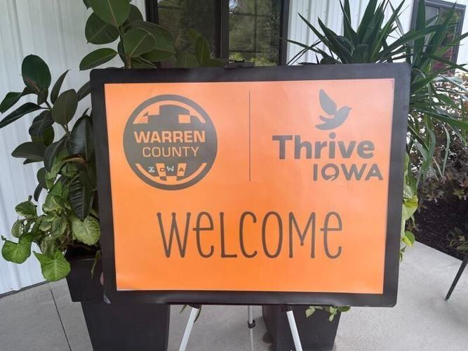 A welcome sign is seen outside The Hive at Busy Bee event venue at the Warren County Thrive Iowa program site launch in Indianola, on Tuesday, June 23, 2026.