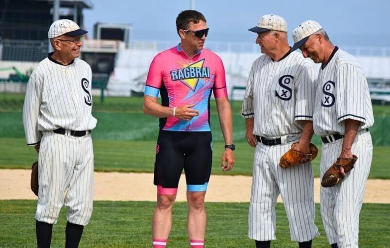 Members of the Field of Dreams Ghost Players play with members of the RAGBRAI route inspection crew in Dyersville on June 6, 2026.