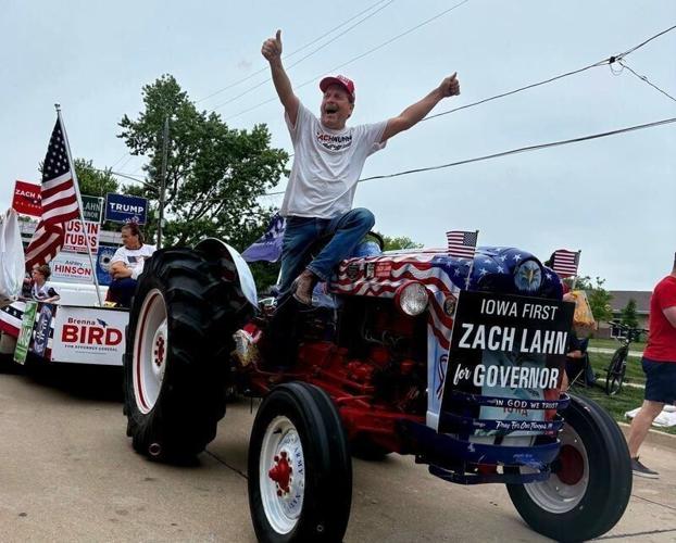 Gary Leffler waves to the crowd gathered for the Polk City Fourth of July parade on July 1, 2026.