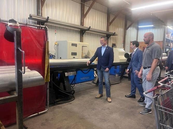 U.S. Rep. Zach Nunn and Acting Labor Secretary Keith Sonderling tour the Auto-jet manufacturing facility in Clive, Iowa on Tuesday, Aug. 4, 2026.