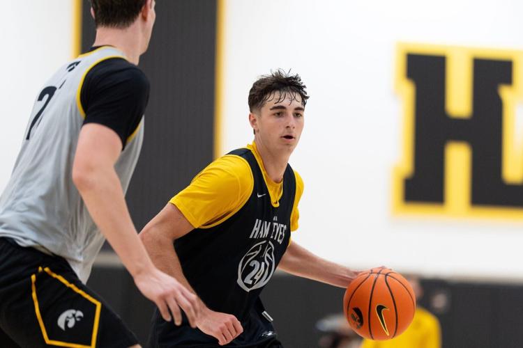 Iowa guard Tate Sage dribbles the ball during a summer basketball practice July 8, 2026 at Carver-Hawkeye Arena in Iowa City,