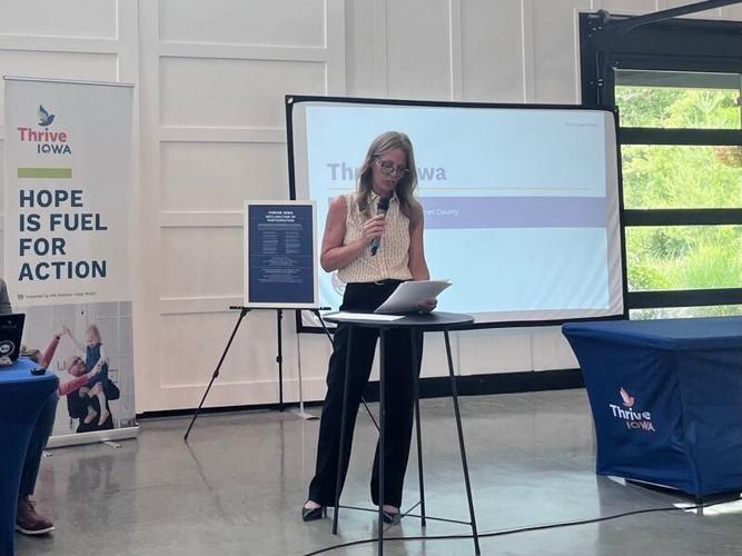 Sarah Downard, Warren County's Thrive Iowa initiative coordinator, speaks at the county's program site launch at The Hive at Busy Bee in Indianola, on Tuesday, June 23, 2026.
