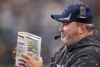 Head coach Mike McCarthy of the Dallas Cowboys looks on during the second half against the Carolina Panthers at AT&T Stadium on October 03, 2021 in Arlington, Texas.