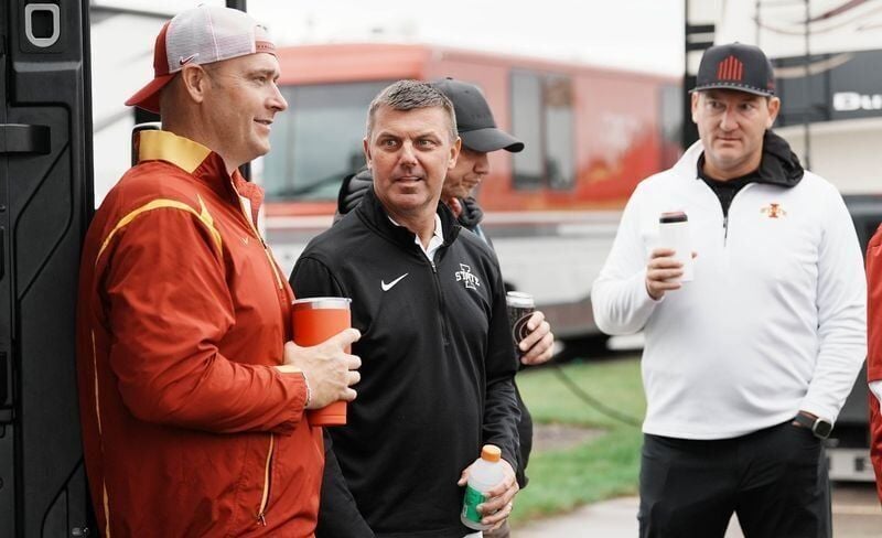 Former Iowa State wide receiver Jack Whitver, middle, tailgates with friends in the RV lots outside Jack Trice Stadium on Sept. 26, 2026, in Ames, Iowa.