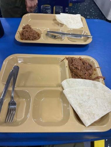 A picture shared by a US Marine deployed on the USS Tripoli of a meal service members on board received.