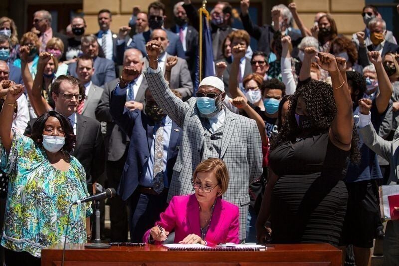 On June 12 at the Iowa Capitol, Gov. Kim Reynolds signs bipartisan legislation banning most police chokeholds and addressing officer misconduct. Protesters and other civil rights advocates had demanded legislation to address police violence. The Legisla...