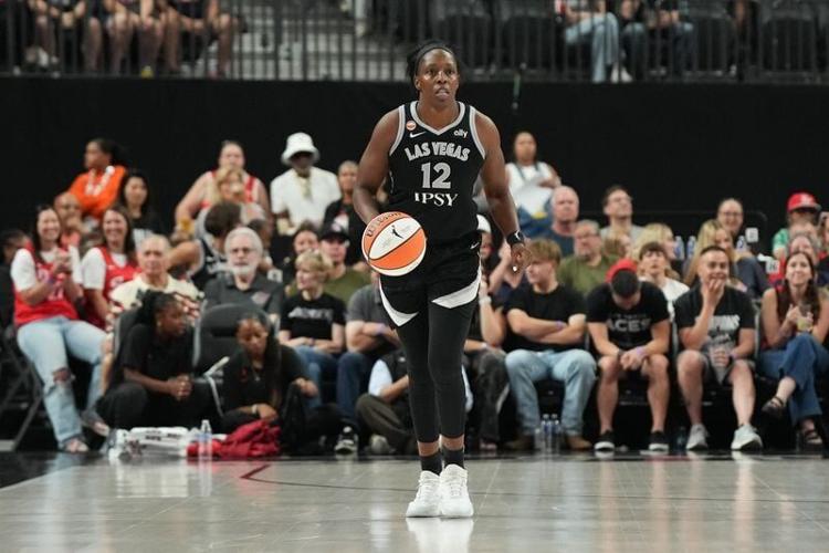 Las Vegas Aces guard Chelsea Gray dribbles during a game against against the Indiana Fever.